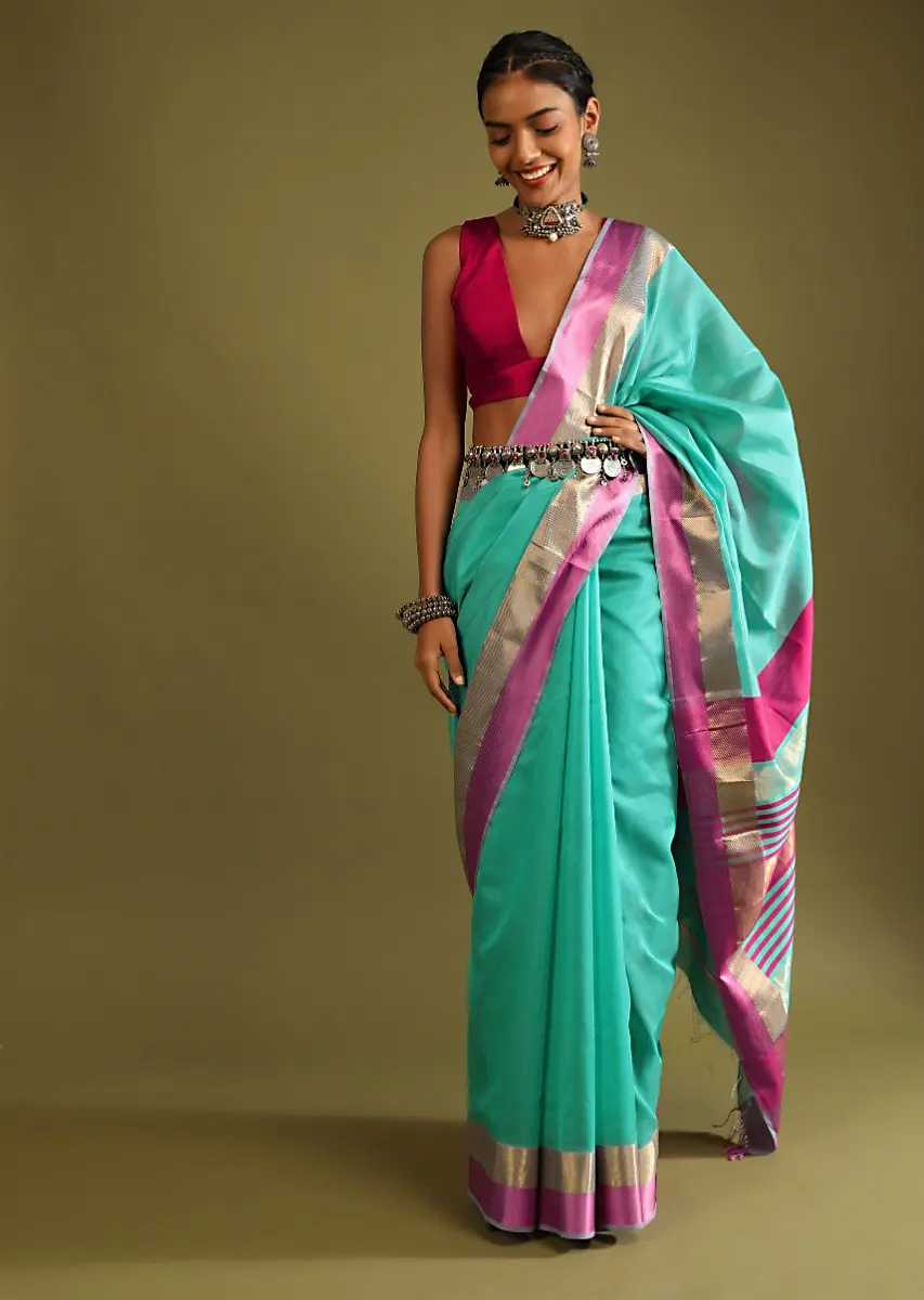 A Gquareen Saree In Tussar Silk With Gold And Pink Woven Border And Striped Pallu Design
